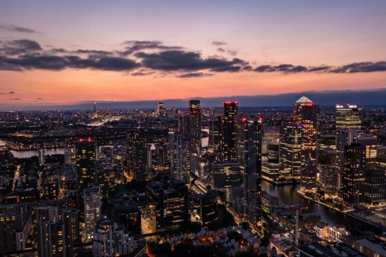 A panoramic aerial view of the East London skyline at night