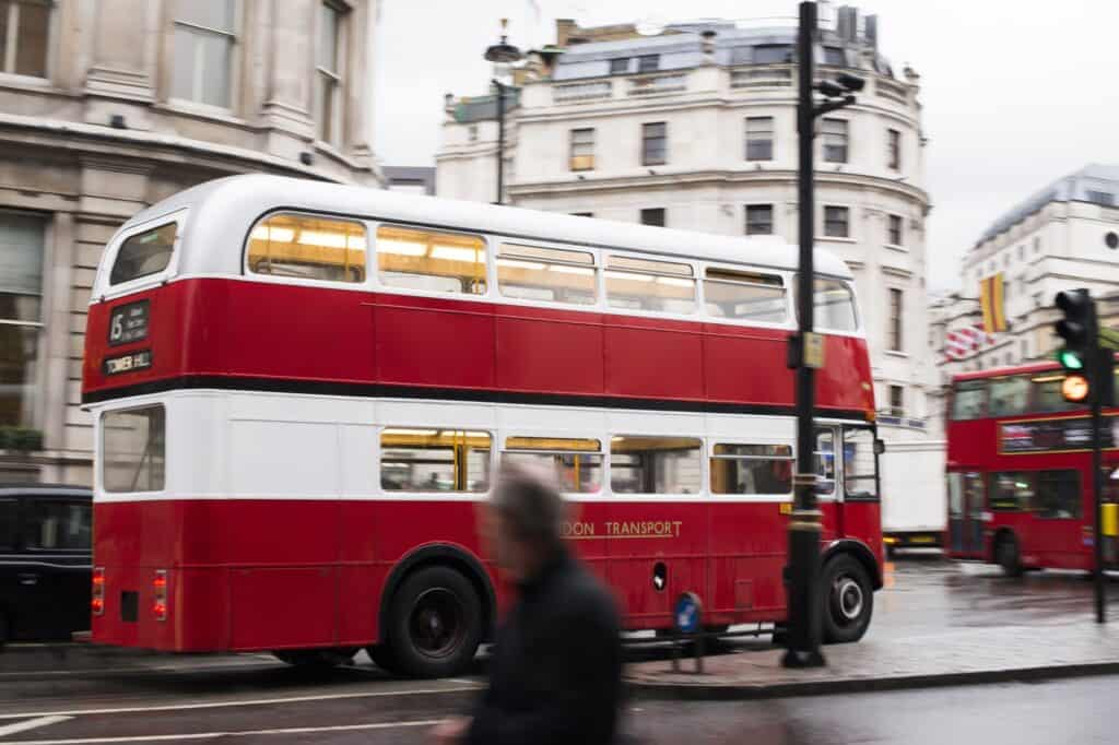 Red London bus on the street in the daytime