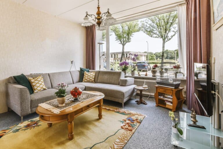 A living room filled with furnitures and fixtures